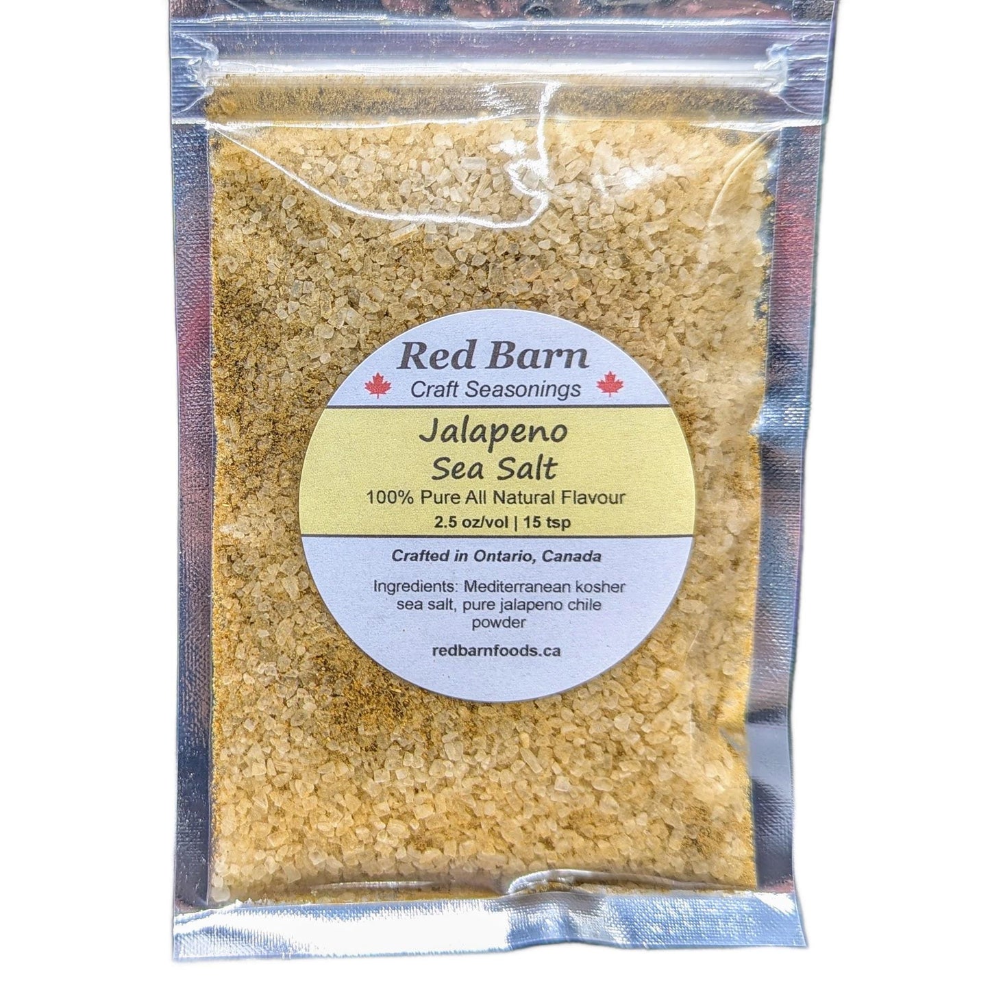 Packaged jalapeno sea salt with Red Barn label on a white background