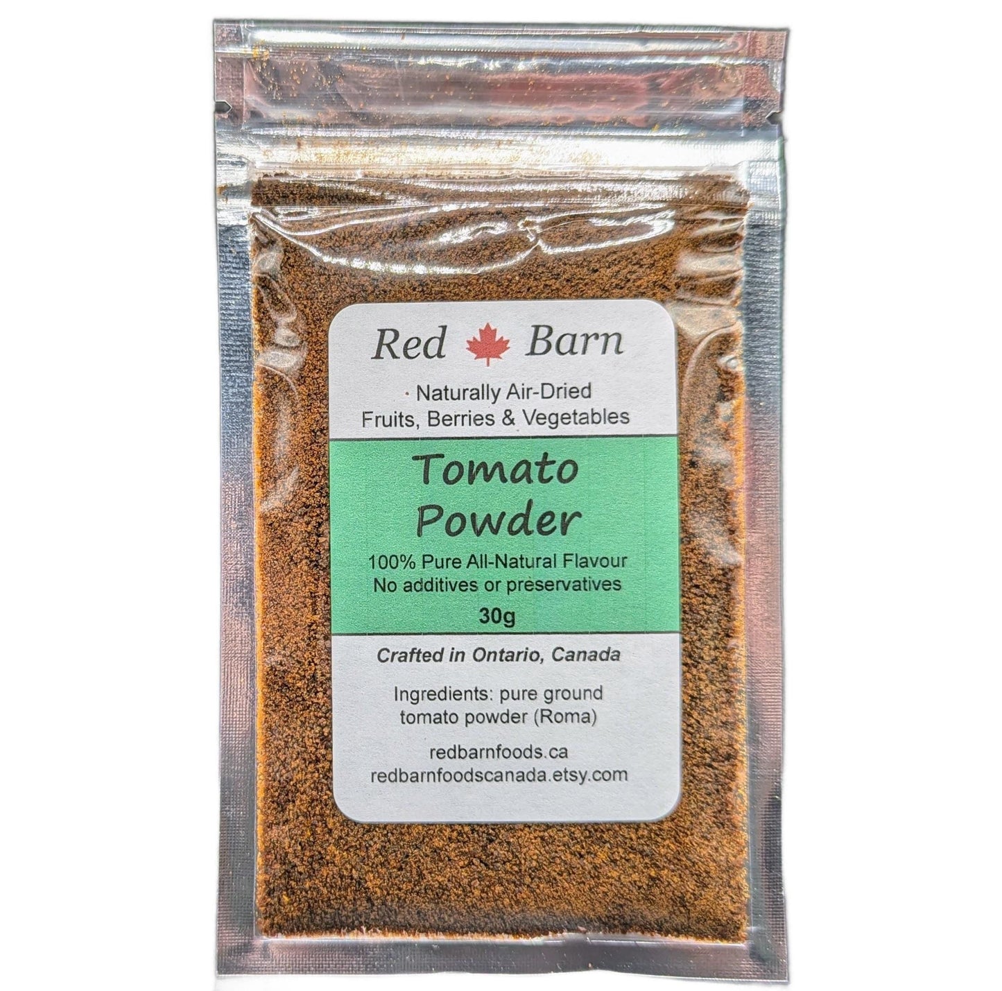 Packaged tomato powder with Red Barn label on a white background