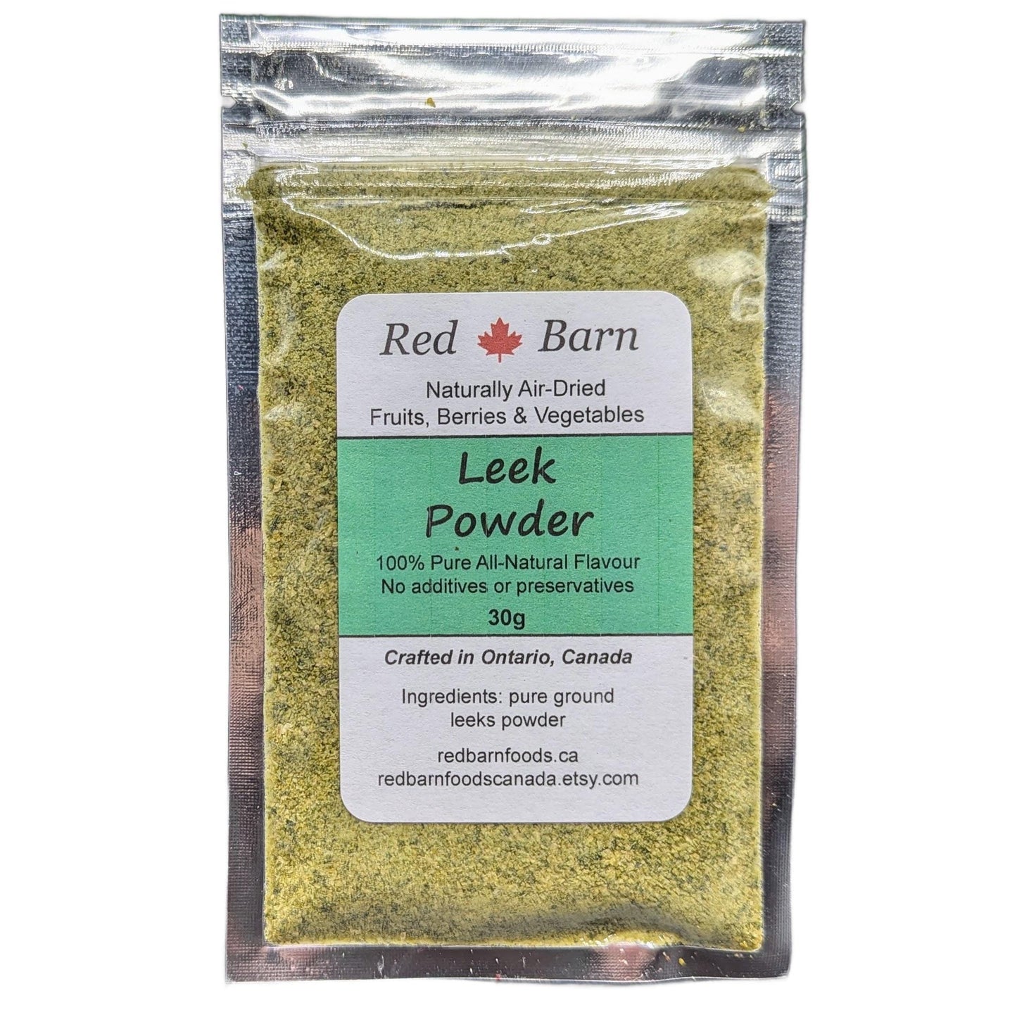 Packaged leek powder with Red Barn label on a white background