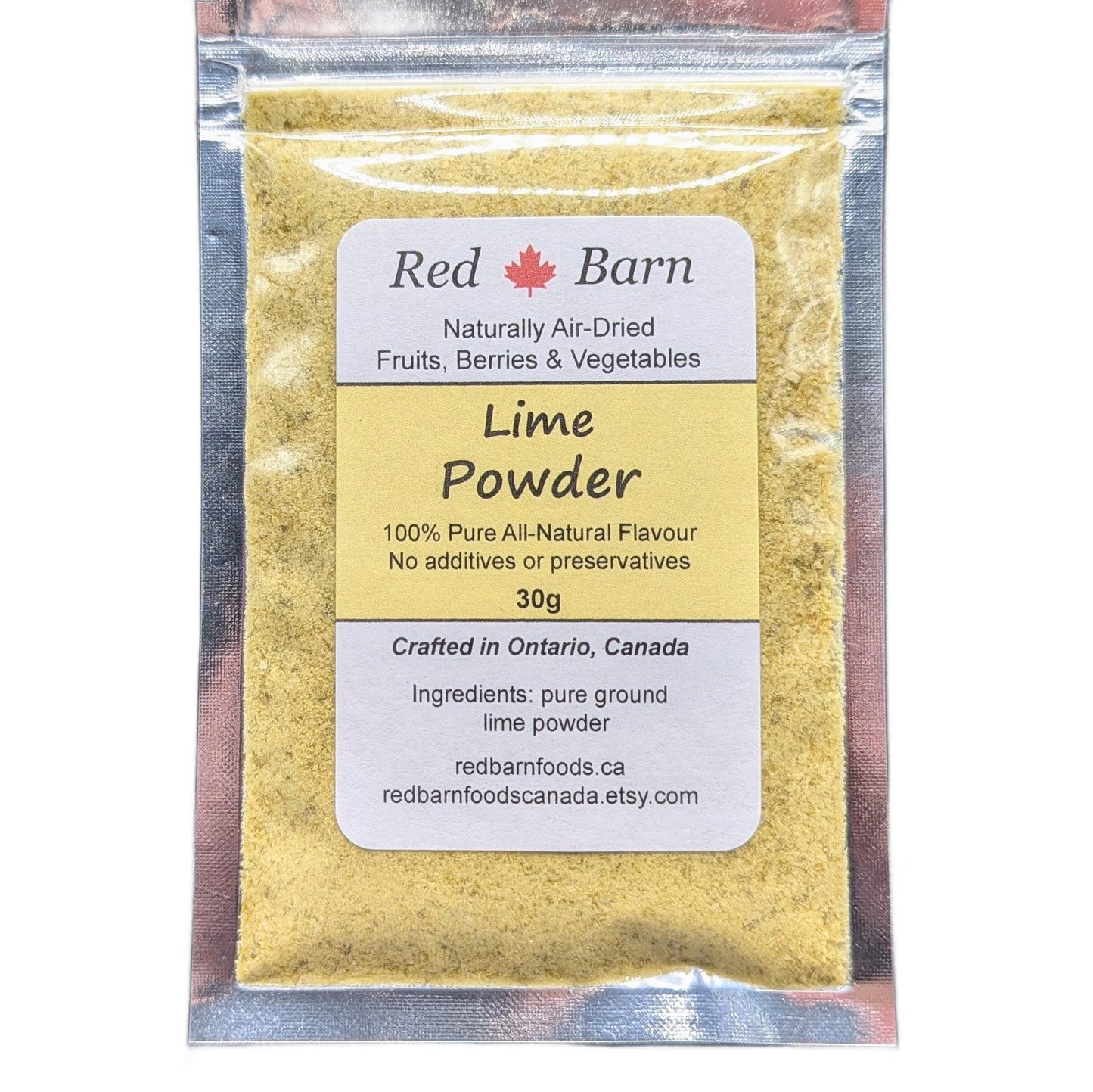 Packaged lime powder with Red Barn label on a white background