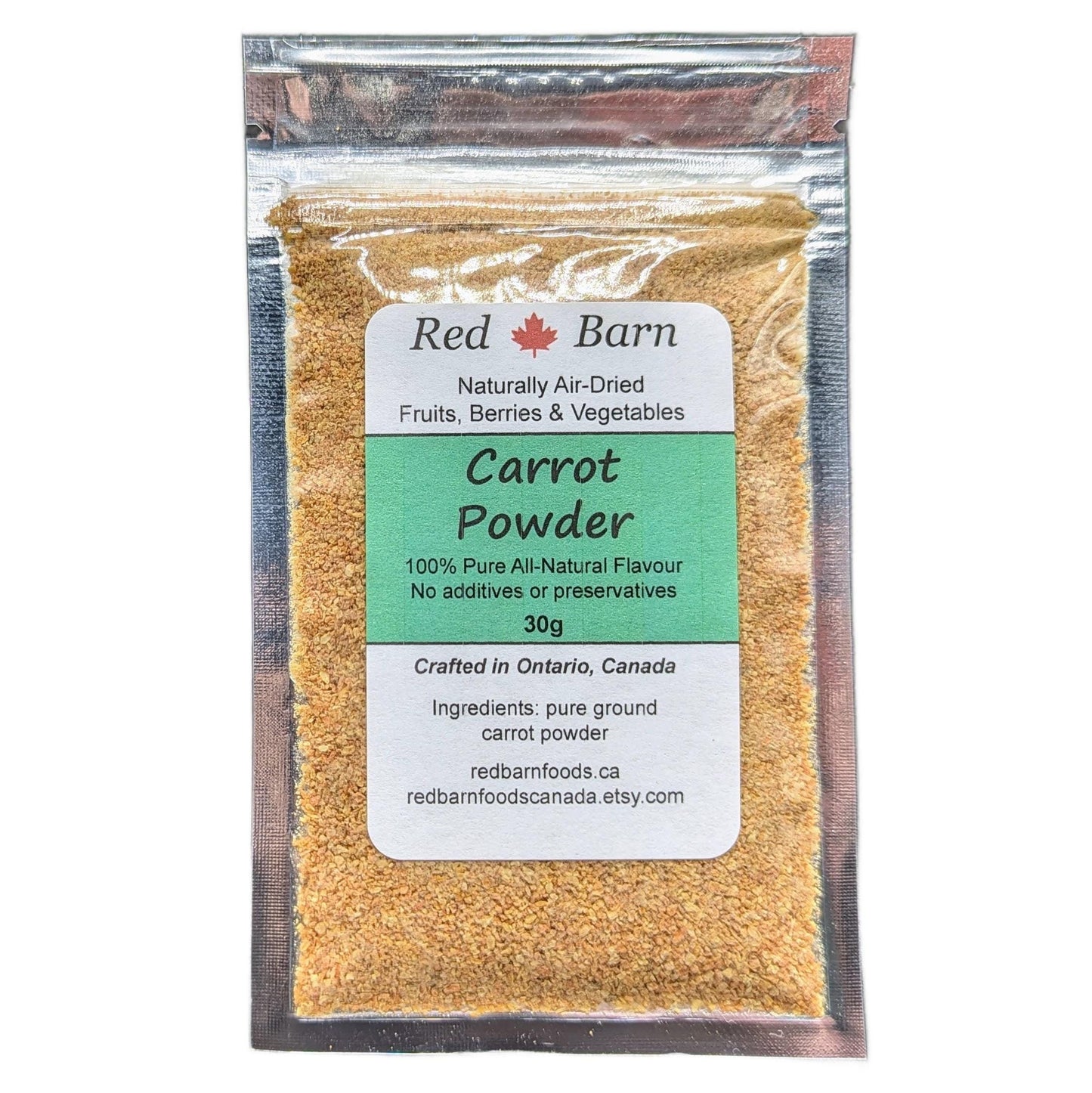Packaged carrot powder with Red Barn label on a white background