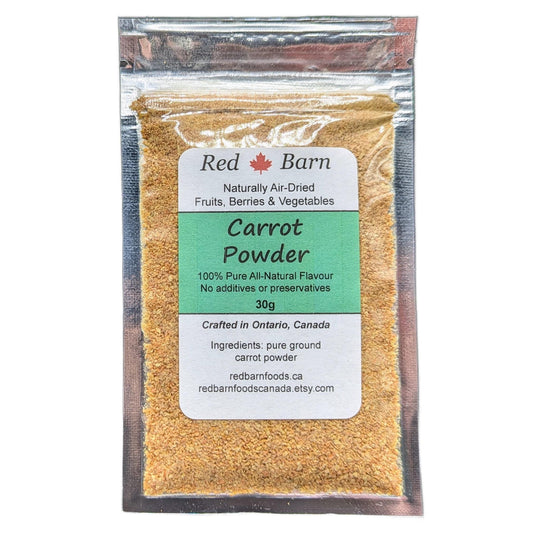 Packaged carrot powder with Red Barn label on a white background