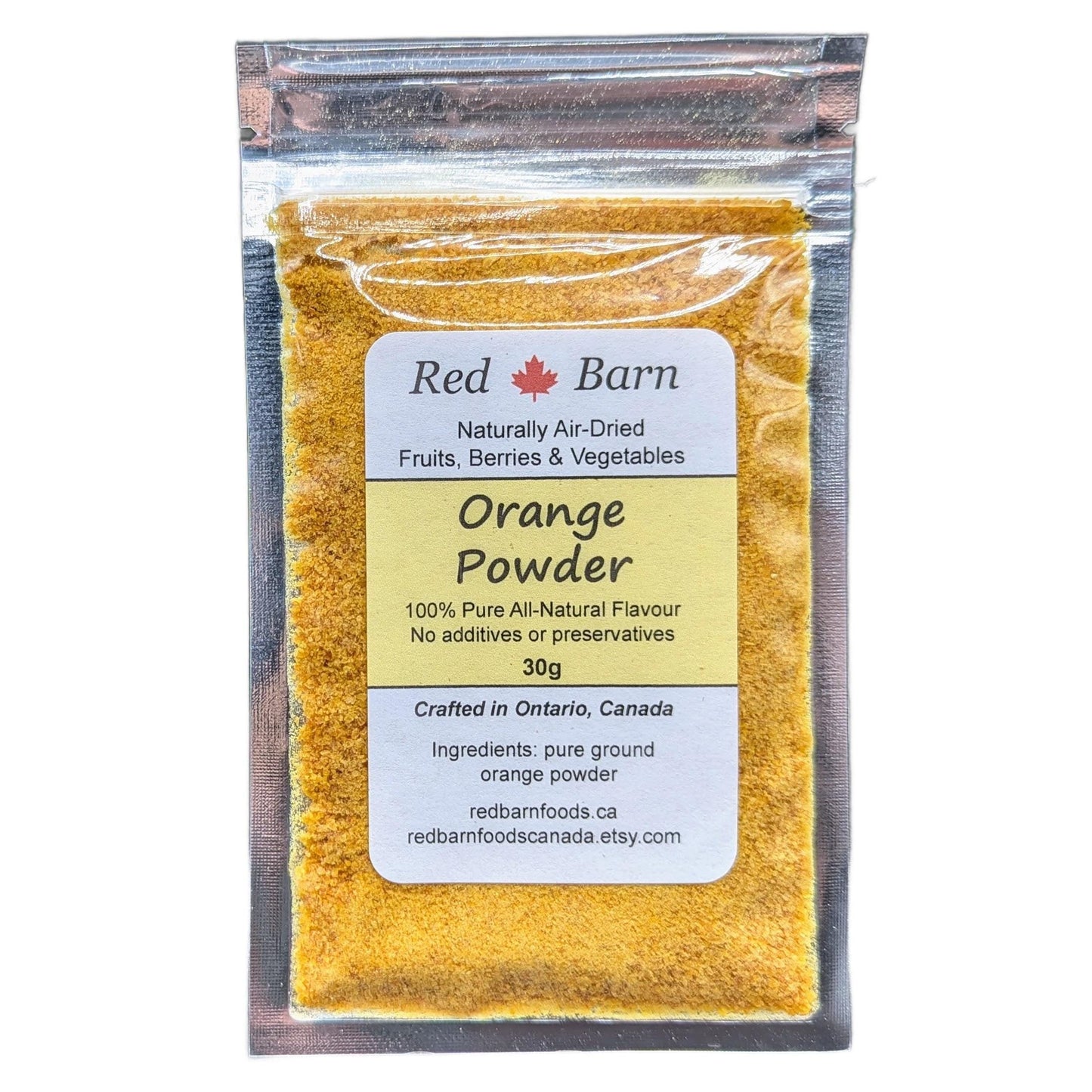 Packaged orange powder with Red Barn label on a white background