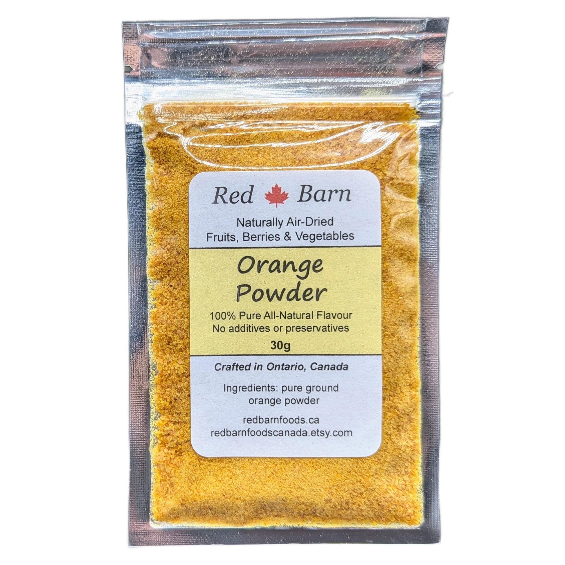 Packaged orange powder with Red Barn label on a white background