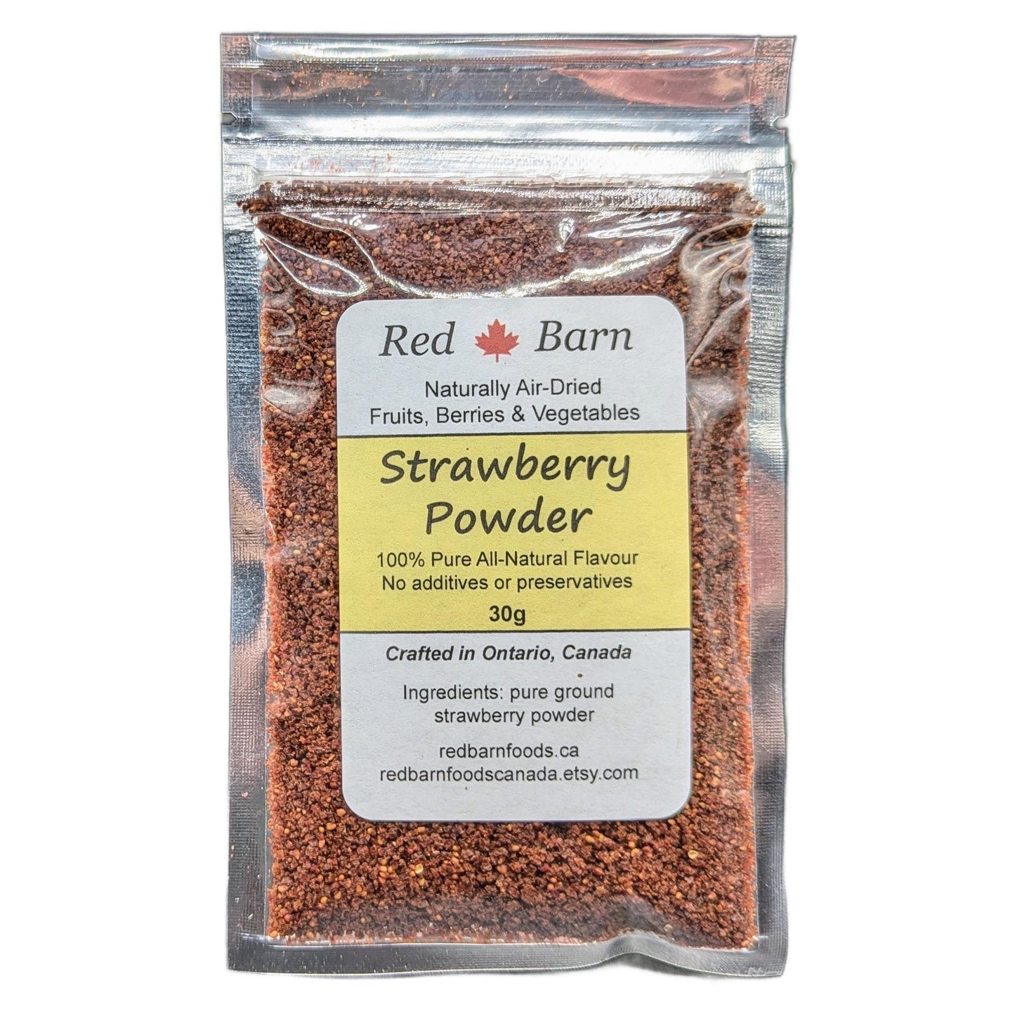 Packaged strawberry powder with Red Barn label on a white background
