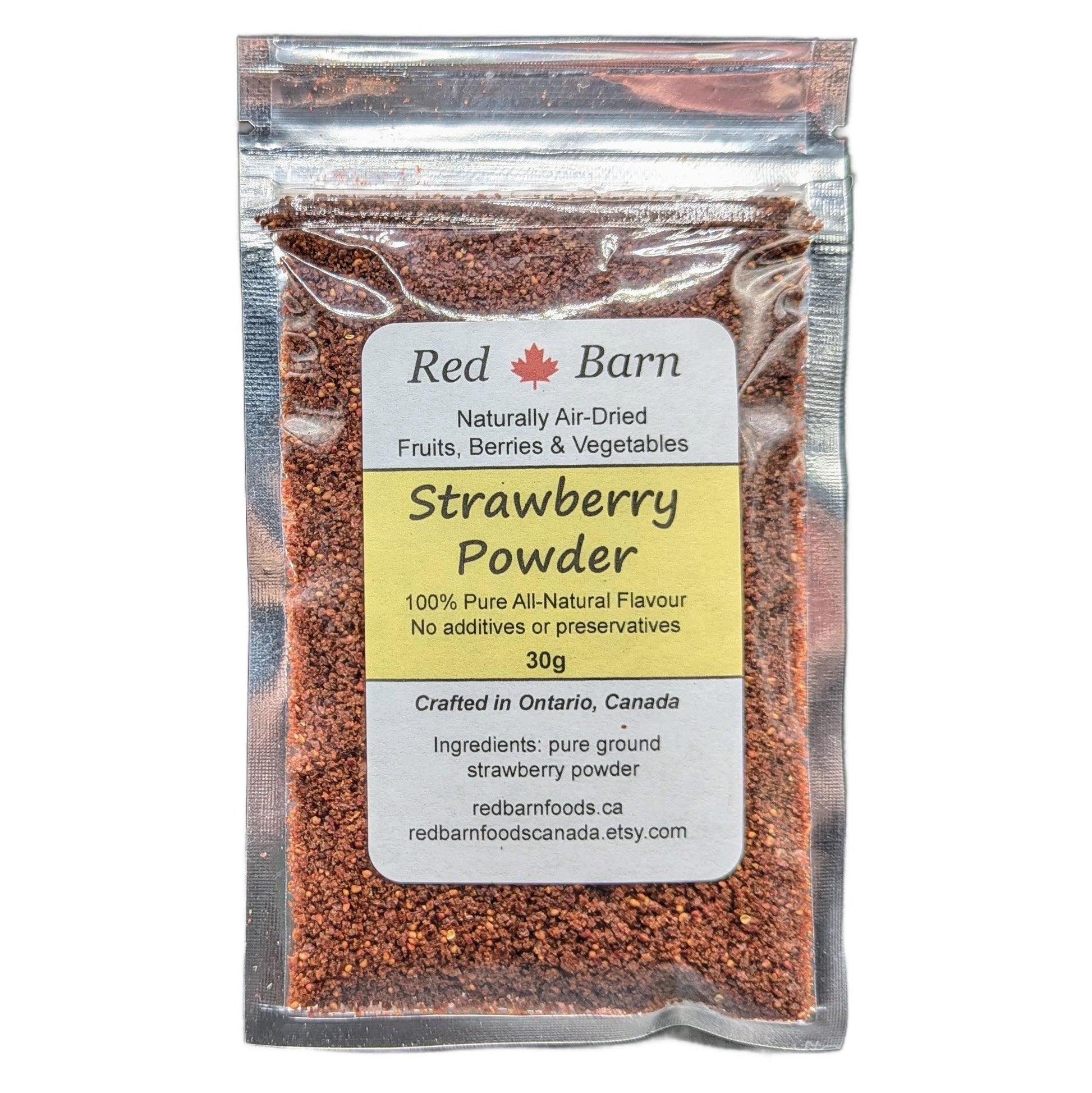 Packaged strawberry powder with Red Barn label on a white background