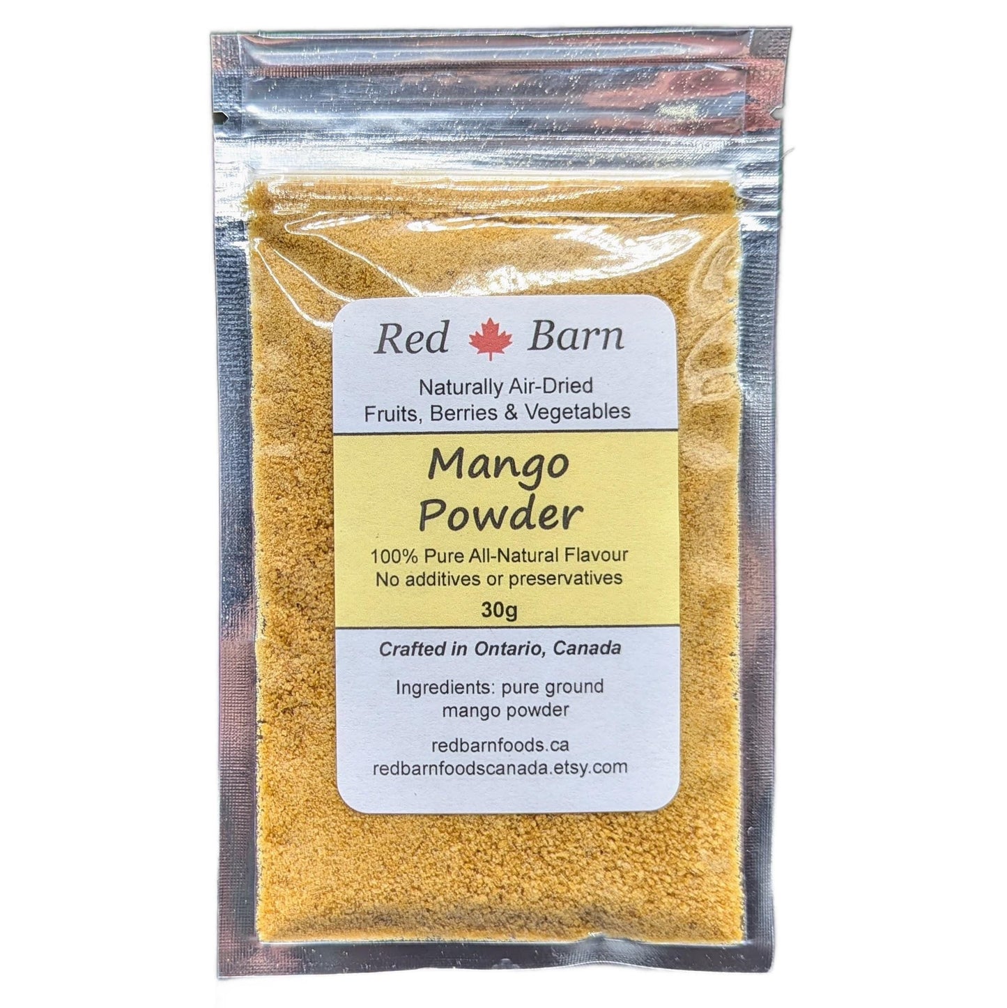 Packaged mango powder with Red Barn label on a white background
