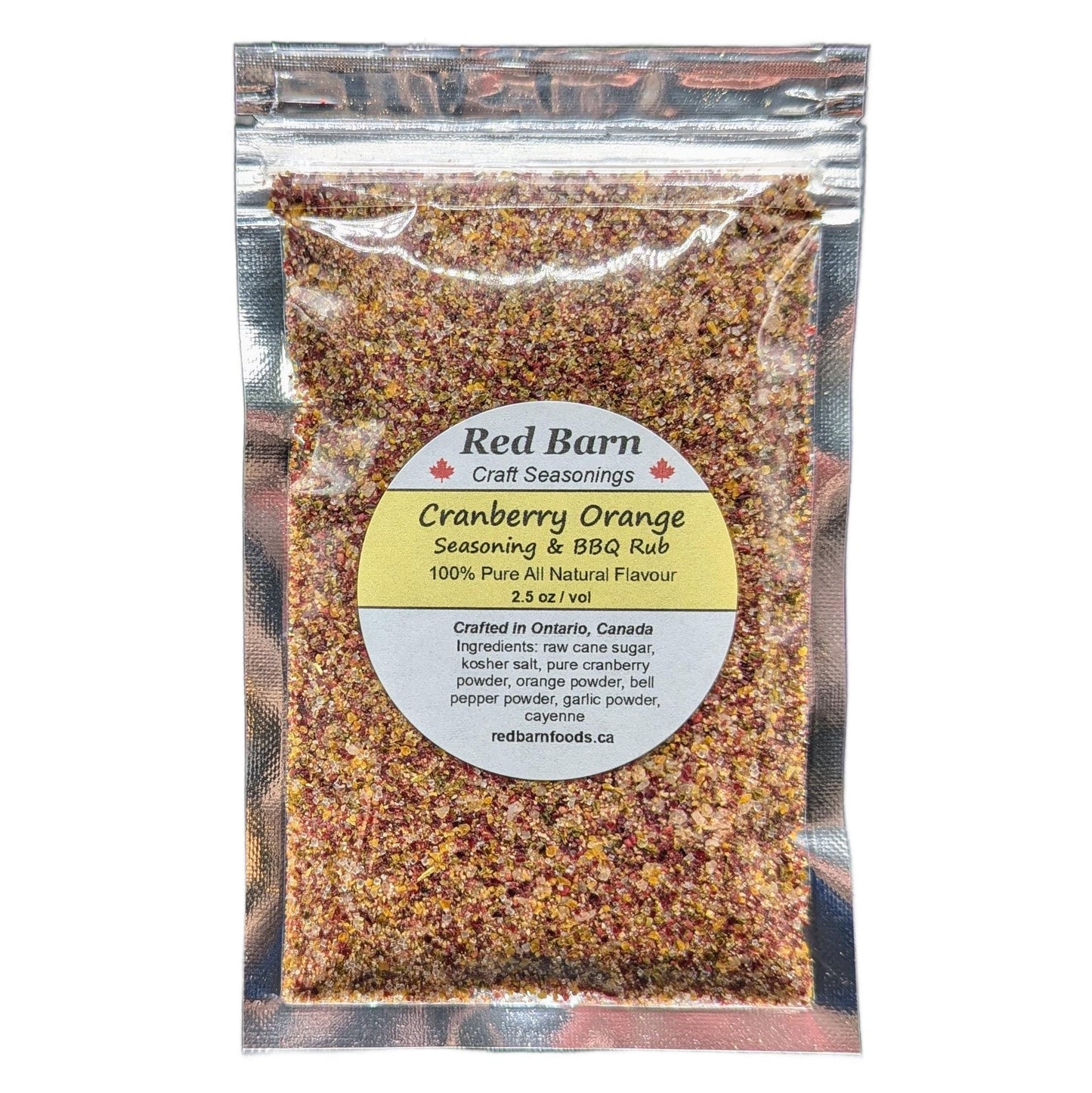 Packaged cranberry orange seasoning & BBQ rub from Red Barn Craft Seasonings on a white background.