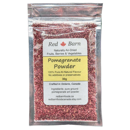 Packaged pomegranate powder with Red Barn label on a white background