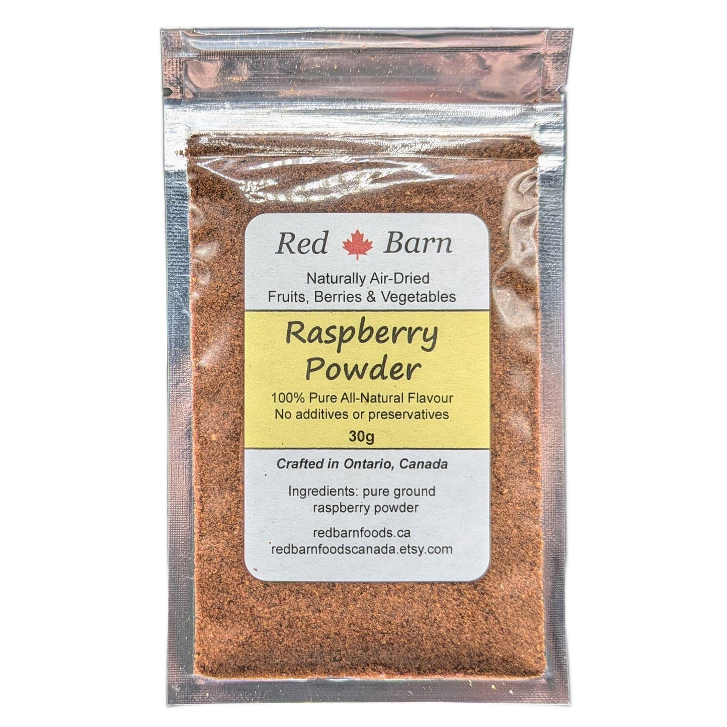 Packaging of Red Barn Raspberry Powder with label on a white background