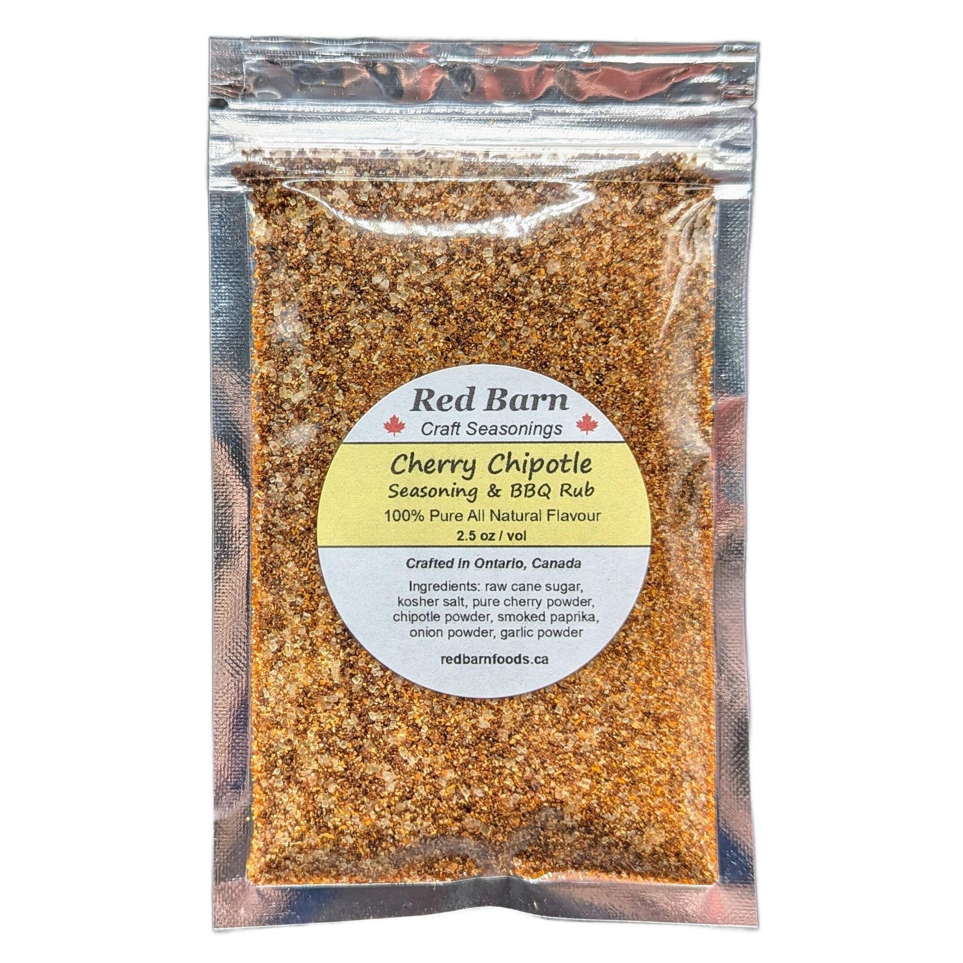 Packaged Cherry Chipotle seasoning and BBQ rub from Red Barn Craft Seasonings on a white background.