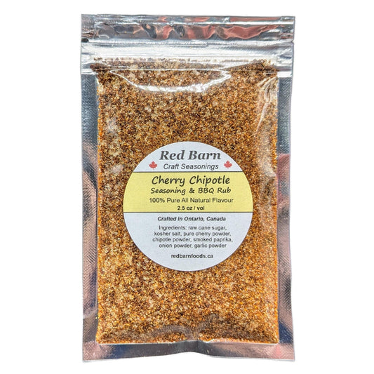 Packaged Cherry Chipotle seasoning and BBQ rub from Red Barn Craft Seasonings on a white background.