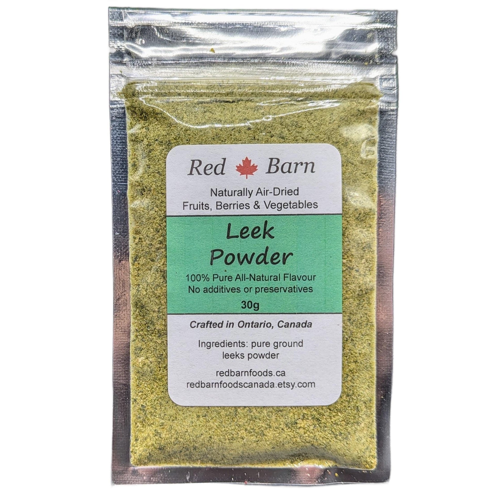 Packaged leek powder with Red Barn label on a white background