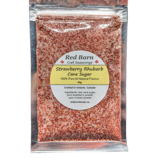Packaged strawberry rhubarb cane sugar with Red Barn label on a white background