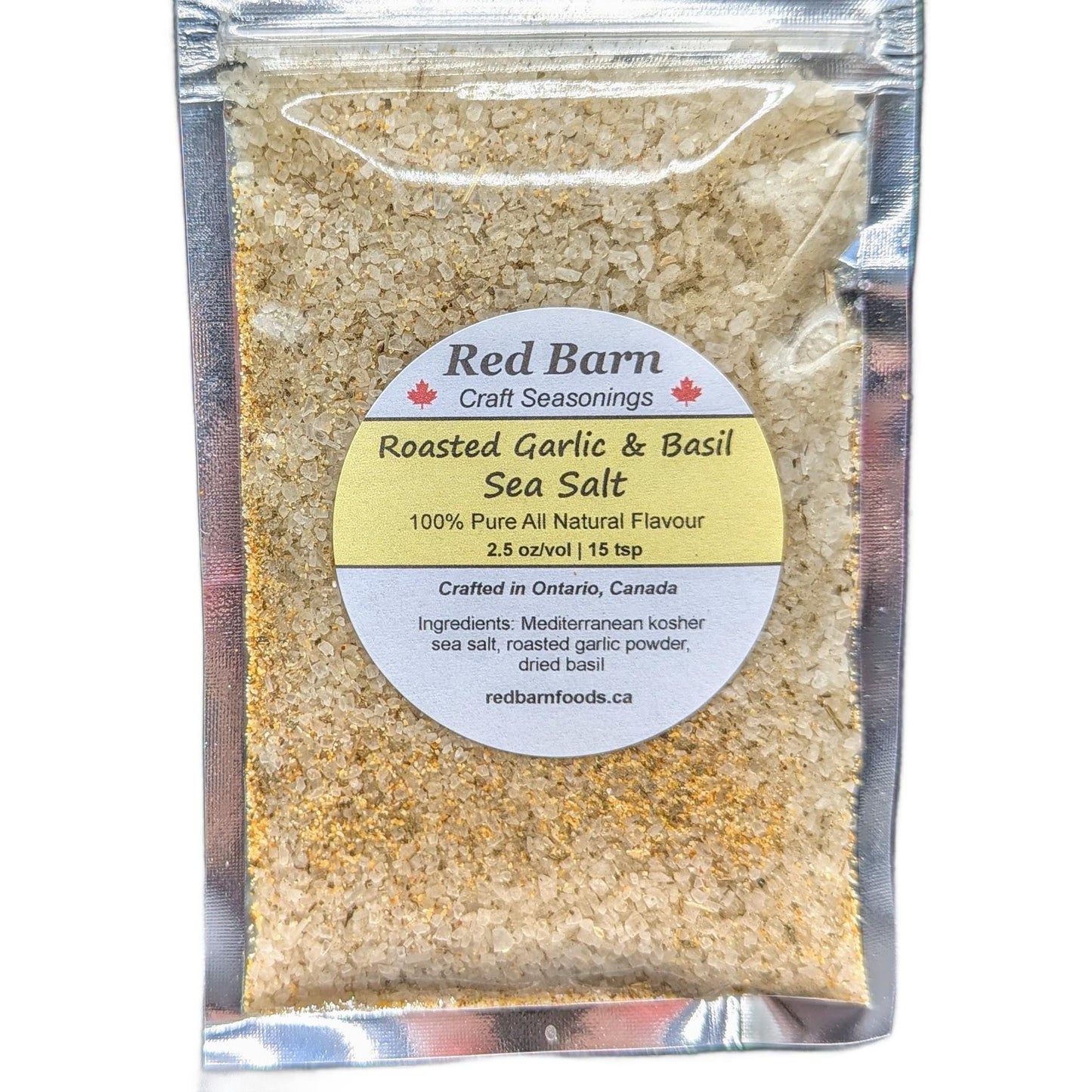 Packaged roasted garlic and basil sea salt with Red Barn Craft Seasonings label on a white background