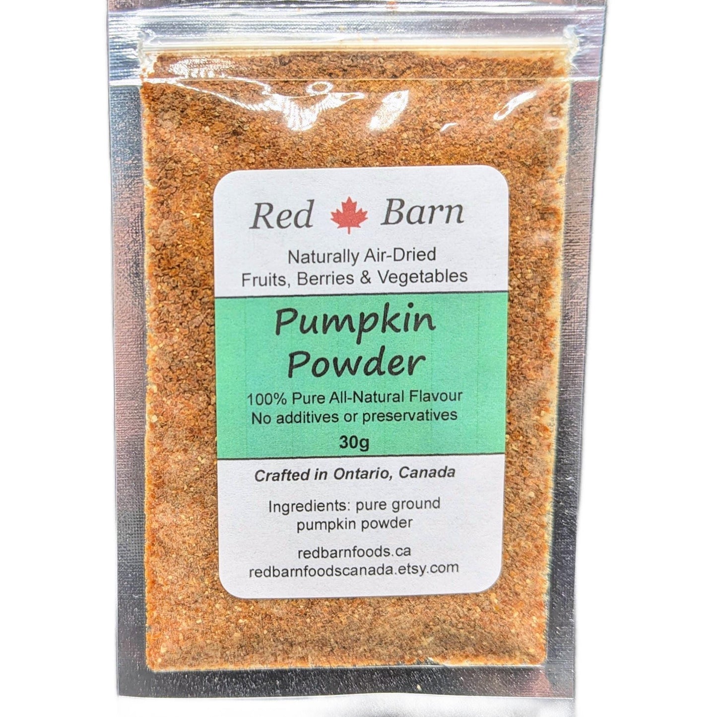 Packaged pumpkin powder with Red Barn label on a white background