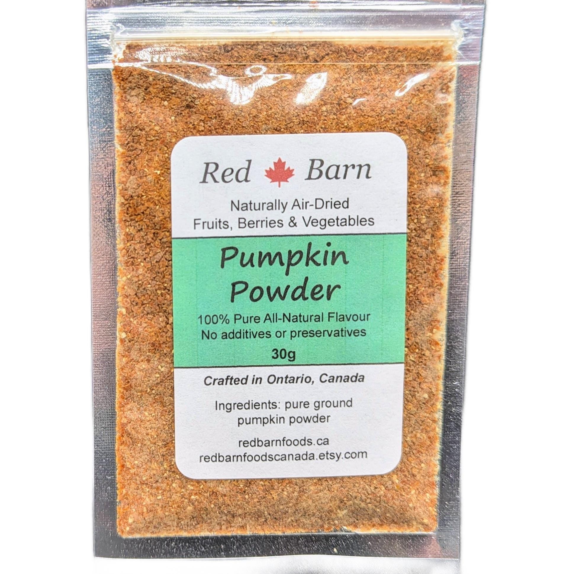Packaged pumpkin powder with Red Barn label on a white background