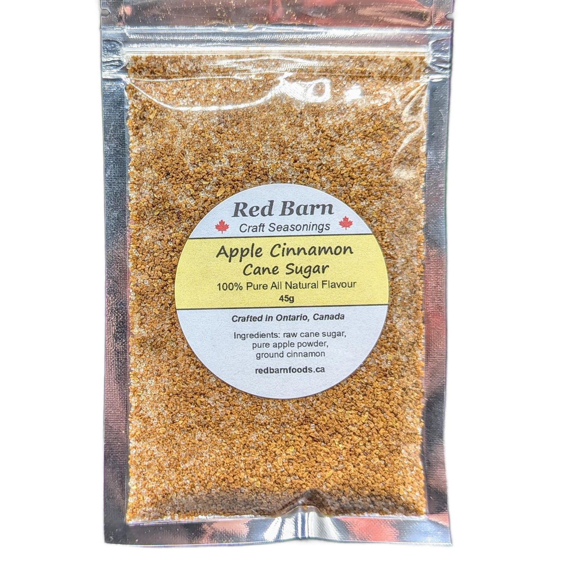 Packaged Apple Cinnamon Cane Sugar from Red Barn Craft Seasonings with a clear front for visibility.